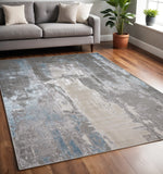 5' X 8' Gray Ivory And Blue Abstract Area Rug