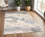 4' X 6' Gray Ivory And Blue Abstract Area Rug