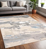 5' X 8' Gray Ivory And Blue Abstract Area Rug
