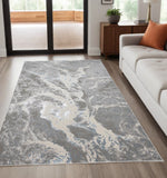 5' X 8' Gray and Ivory Abstract Power Loom Area Rug