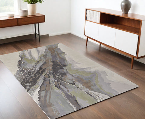 4' X 6' Green Purple And Ivory Abstract Area Rug