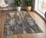 4' X 6' Brown Blue And Ivory Abstract Distressed Area Rug