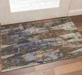 2' X 3' Brown Blue And Ivory Abstract Distressed Area Rug