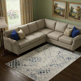 7' X 10' Ivory And Blue Abstract Power Loom Distressed Area Rug