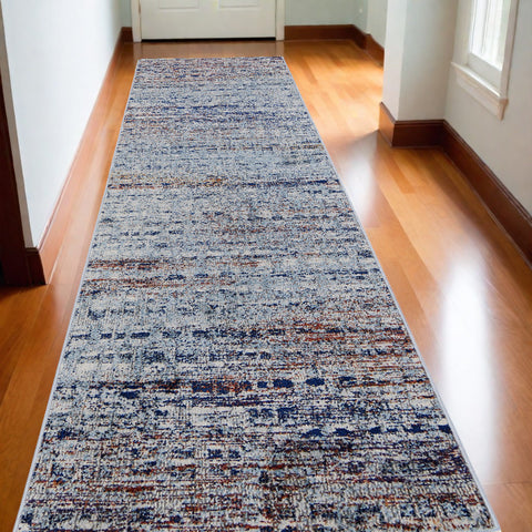 10' Ivory Blue and Orange Abstract Power Loom Runner Rug