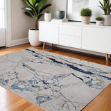 4' X 6' Ivory and Blue Marble Power Loom Distressed Area Rug