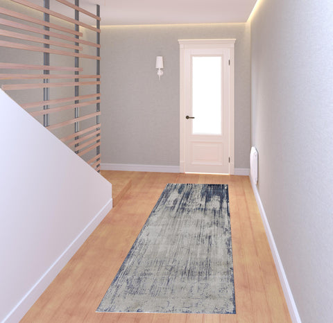 8' Tan Blue And Ivory Abstract Power Loom Distressed Runner Rug