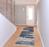 8' Ivory Blue And Gray Abstract Power Loom Distressed Runner Rug