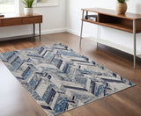 4' X 6' Ivory Blue And Gray Chevron Distressed Area Rug