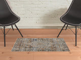 2' X 3' Tan Blue And Burnt Orange Oriental Distressed Area Rug With Fringe