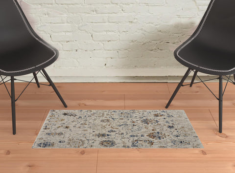 2' X 3' Ivory Blue And Burnt Orange Floral Distressed Area Rug With Fringe