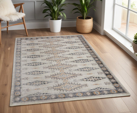 4' X 6' Ivory Black And Gray Oriental Area Rug