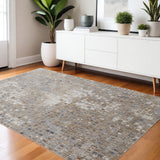 4' X 6' Tan Ivory And Blue Geometric Distressed Area Rug