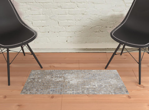 2' X 3' Tan Ivory And Blue Geometric Distressed Area Rug