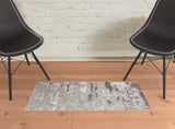 2' X 3' Tan Ivory And Blue Abstract Distressed Area Rug