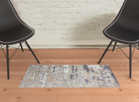 2' X 3' Tan Ivory And Blue Abstract Distressed Area Rug
