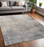 5' X 8' Ivory Gray And Tan Abstract Distressed Area Rug