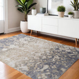 4' X 6' Ivory Tan And Blue Abstract Distressed Area Rug