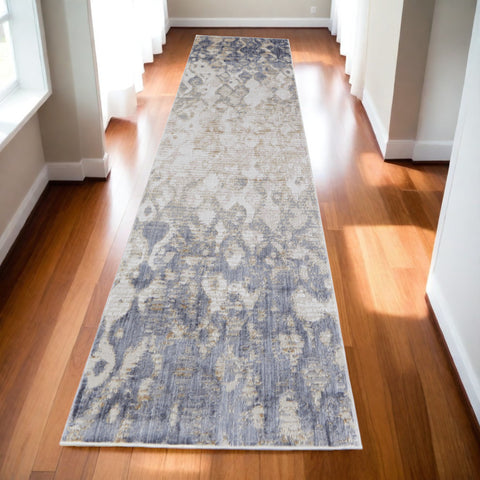 10' Tan and Ivory Abstract Power Loom Distressed Non Skid Runner Rug