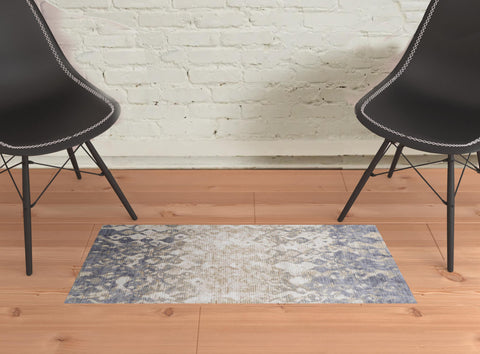 2' X 3' Ivory Tan And Blue Abstract Distressed Area Rug