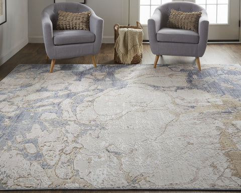 2' X 3' Tan Blue And Beige Abstract Distressed Area Rug