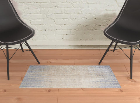 2' X 3' Tan And Blue Abstract Distressed Area Rug