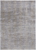 5' X 8' Taupe Silver And Tan Abstract Power Loom Area Rug