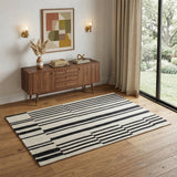 4' X 6' Ivory and Black Wool Abstract Hand Tufted Area Rug