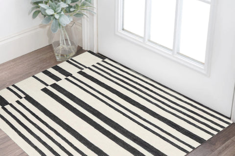 2' X 3' Ivory and Black Wool Abstract Hand Tufted Area Rug