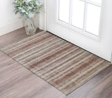 2' X 3' Tan and Ivory Abstract Hand Woven Area Rug