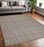 5' X 8' Gray Ivory And Tan Hand Woven Area Rug