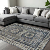 7' X 10' Ivory And Blue Medallion Distressed Area Rug
