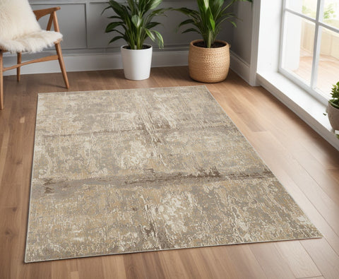 4' X 6' Tan Ivory And Brown Abstract Area Rug