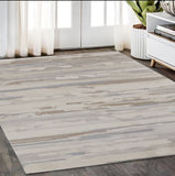 5' X 8' Brown Ivory And Tan Abstract Distressed Area Rug