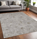 5' X 8' Gray Ivory And Tan Abstract Distressed Area Rug