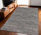 5' X 8' Gray and Ivory Abstract Power Loom Area Rug