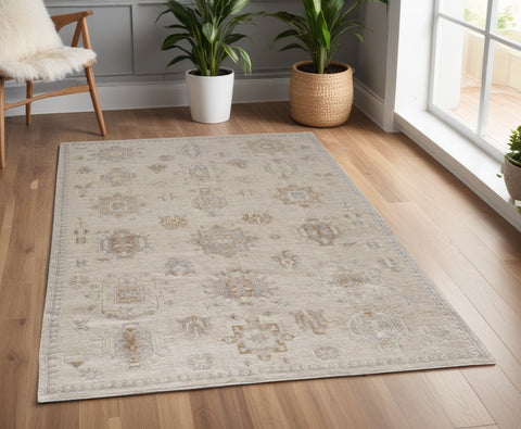 4' X 6' Tan and Brown Floral Hand Knotted Area Rug