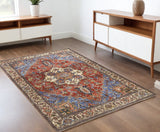 4' X 6' Blue And Orange Floral Medallion Area Rug
