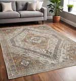 5' X 8' Brown Ivory And Orange Medallion Distressed Washable Area Rug