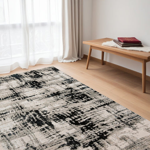 5' X 8' Black Gray And White Abstract Area Rug