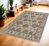 4' X 6' Tan Ivory And Brown Power Loom Area Rug