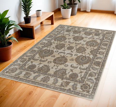 4' X 6' Tan Ivory And Brown Power Loom Area Rug