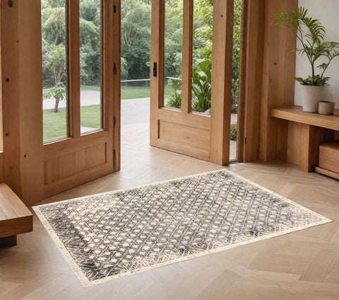 2' X 3' Ivory And Black Abstract Geometric Area Rug