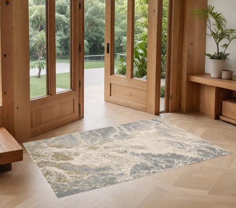 2' X 3' Ivory Tan And Gray Abstract Area Rug