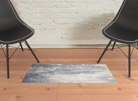 2' X 3' Ivory Gray And Blue Abstract Area Rug