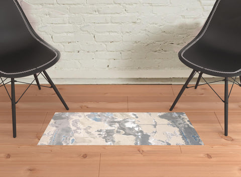 2' X 3' Gray Ivory And Blue Abstract Area Rug