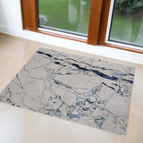 2' X 3' Ivory and Blue Marble Power Loom Distressed Area Rug