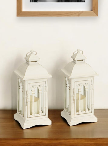 Set of Two Ivory Distressed Ornate Metal And Glass Tabletop Lantern Candle Holders With Candle
