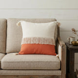20" Off White And Orange Cotton Throw Pillow with Fringe And Tassels