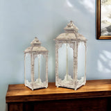 Set of Two Beige Distressed Ornate Glass And Metal Floor Lantern Candle Holders